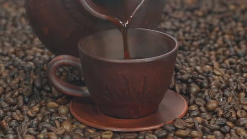 Fresh Coffee Pouring into Rustic Cup