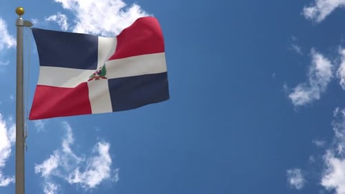 Dominican Republic Flag Waving Against Blue Sky