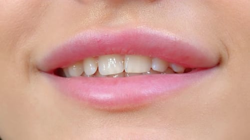 Extreme Close-Up of Woman's Lips and Teeth