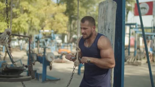 Athlete Training Triceps Pushdown Exercise Outdoor