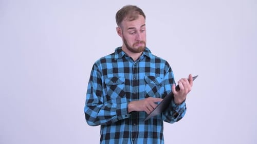 Happy Man Showing Blank Clipboard