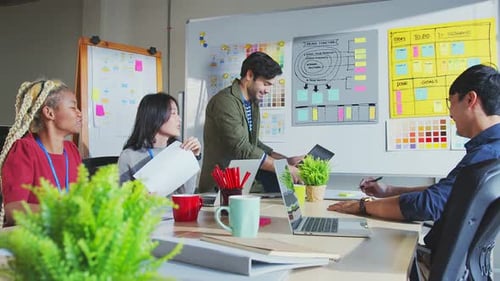 Young Adults Collaborate During a Business Meeting