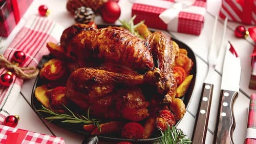 Roasted Whole Chicken or Turkey Served in Iron Pan with Christmas Decoration