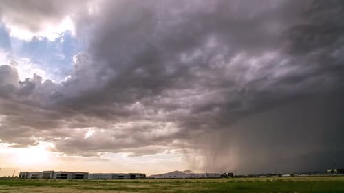 Time lapse of thunder storm moving through Utah Valley as sun peaks
