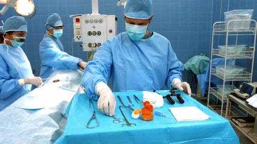 Surgical Team Performing Operation in Hospital Operating Room