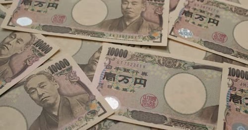 Pile of Crisp Japanese Yen Banknotes Close Up