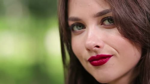 Glamorous Woman Eating a Cherry Close Up