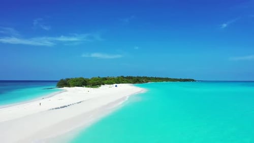 Daytime drone island view of a white paradise beach and turquoise sea background in vibrant