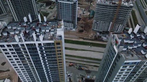 Construction of modern multi-storey buildings. Construction of a new city block.