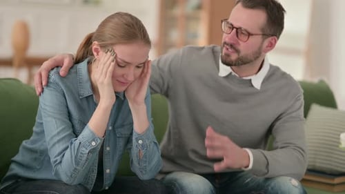 Man Trying To Calm Down Crying Woman Couple