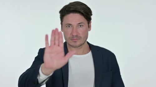Man Showing Stop Sign With Hand Gesture