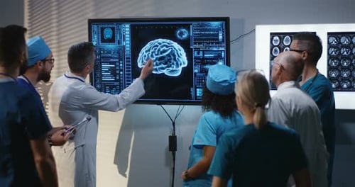 Medical Team Analyzes Brain Scan in Hospital