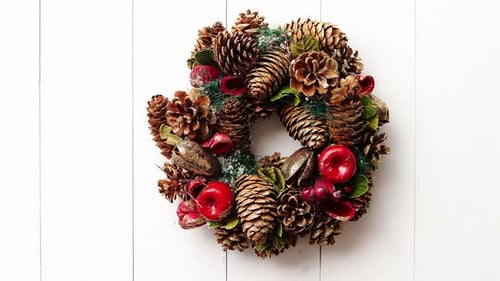 Festive Christmas Wreath on White Wooden Background