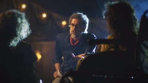 Director Gives Direction to Actors in Studio