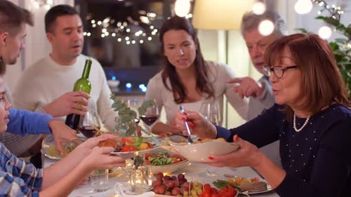 Family Celebrates at a Festively Decorated Table
