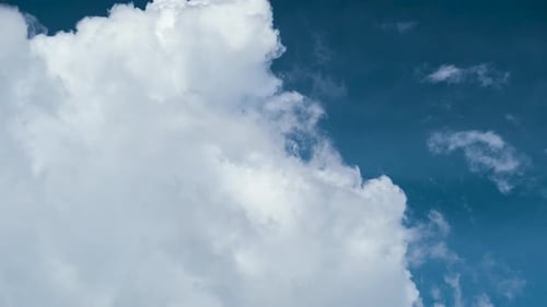Timelapse of White Puffy Cumulus Clouds Forming on Summer Blue Sky