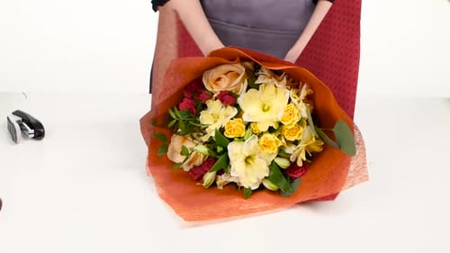 Hands Female Florist Make Up the Composition of Flowers, White, Close Up