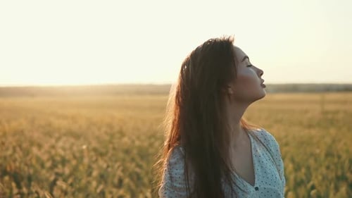 Lovely Girl in Open Field.