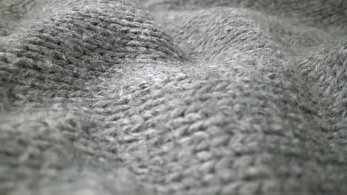 Extreme Detail View of Sheep Wool Cloth Texture Flowing in Macro Dolly Shot