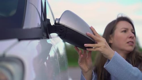 Woman Reacts to Broken Car Side Mirror