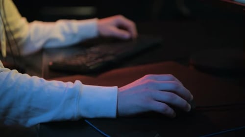 Close Up of Hands Typing on Keyboard