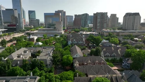 Residential district in Dallas Texas. Aerial orbit of downtown urban city center.