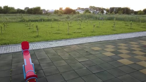 Empty Playground with Swings and Toys in a Park
