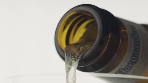 Close Up Beer Bottle Pouring