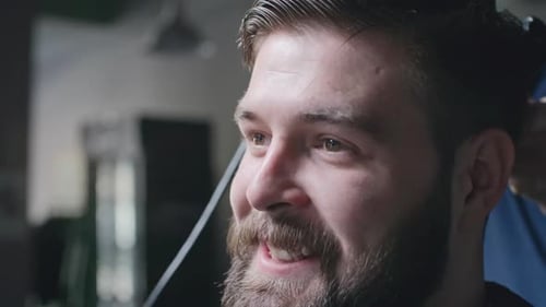 Man Getting Haircut and Style at Barber Shop