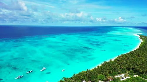 Aerial drone shot travel of luxury island beach lifestyle by blue water and white sandy background o