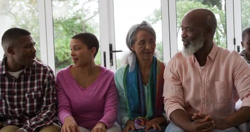 Happy Multi-Generational Family Sharing Time Together at Home