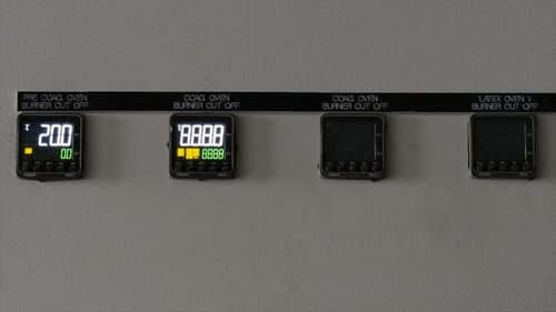 Sensors on the Device Light Up. Enabling Equipment Sensors at the Factory. Close-up.
