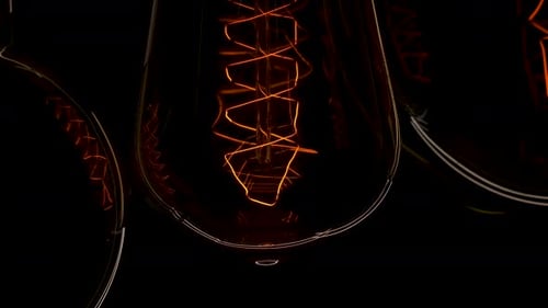 Extreme Close Up Three Tungsten Old Edison Retro Lamp Turn On. Light Bulb Threads Are Shaking. Light