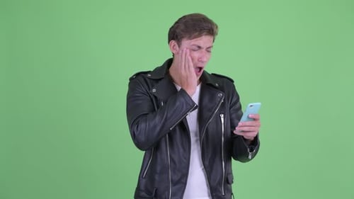 Disappointed Young Adult Reacts to Smartphone Content