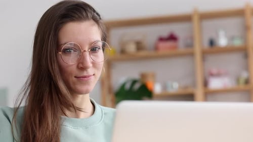 Woman Working on Laptop at Home, Close Up