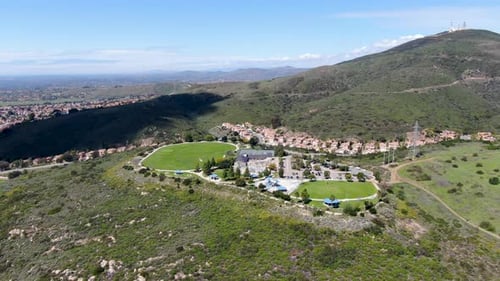 Aerial View of Small Community Park in Middle Class Neighborhood in the Valley During Sunny Day
