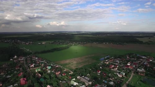 Flying Over Russian Villages Among Green Fields and Forests