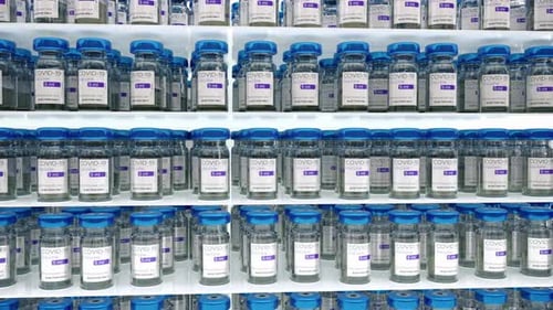Rows of COVID-19 Vaccine Vials on Medical Storage Shelves