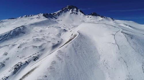 Majestic Snow Covered Mountains Aerial View