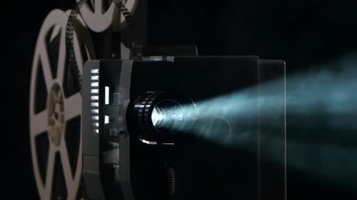 Close Up of a Vintage Movie Projector. Projection Rays