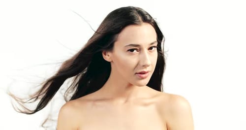 Woman with Dark Hair Blowing in the Wind