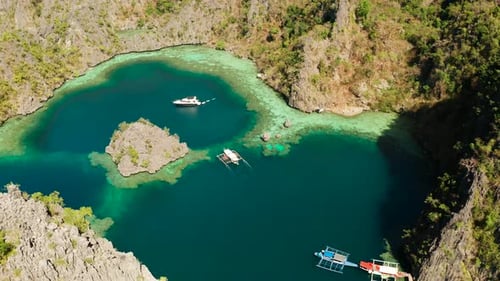 Aerial View of Boats in Tropical Lagoon