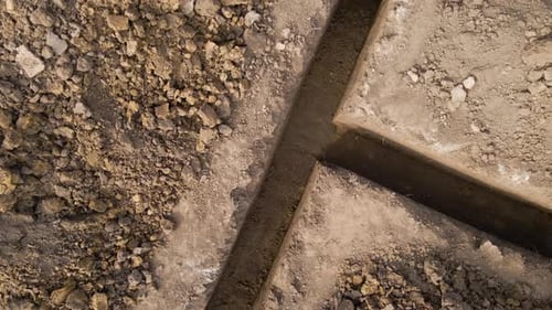 Dug Out Trench for Building Works of New House Concrete Foundation on Construction Site