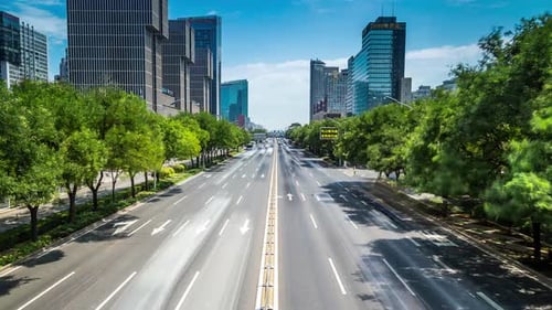 Time lapse of busy traffic and modern buildings in Beijing city , China.