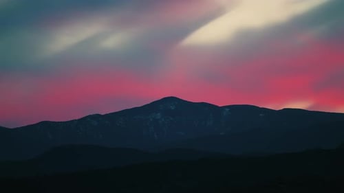 Snowy Peak Mountain with Pink Sky
