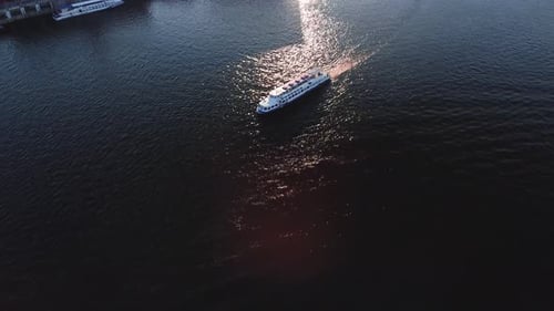 Aerial view of the modern sailboat sailing on the river Dnieper, Kyiv Ukraine