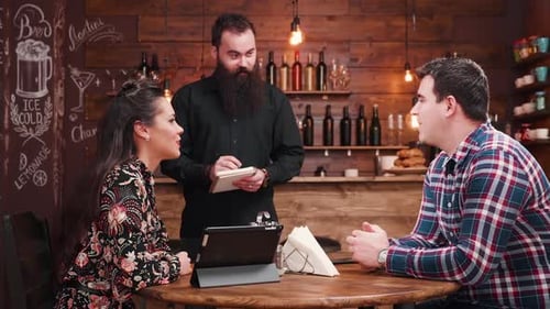 Couple Ordering at Cafe, Bearded Waiter Taking Order