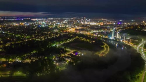 Night view of the city from the air time lapse