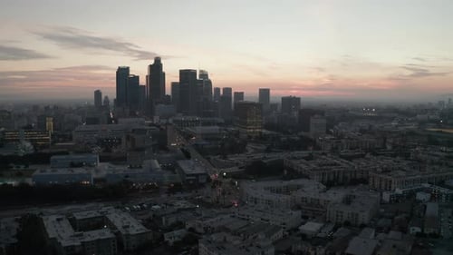 Cinematic View of Busy Downtown Los Angeles Right After Dusk with Skyline City Lights and