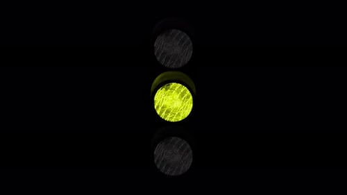 Traffic Light Changes From Green to Yellow to Red